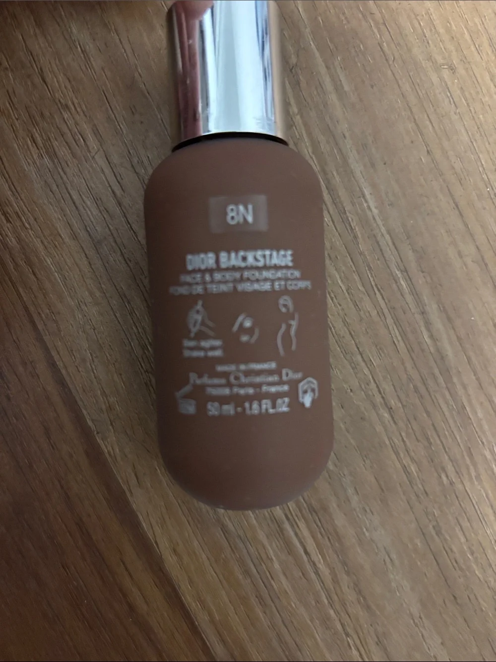 Dior Brown Foundation Bottle with Silver Cap